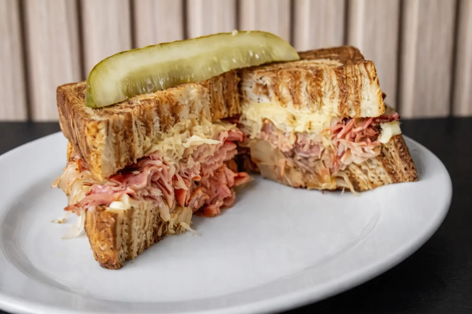 Reuben Sandwich at Steve's Famous Sandwich Co 99 Ave Edmonton - classic corned beef, sauerkraut, Swiss cheese, 1000 Island on marble rye